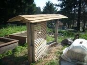CCAT natural wall construction Earthen informational kiosk for CCAT