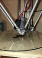 A picture of my operational 3-D printer, printing a Yooper keychain.