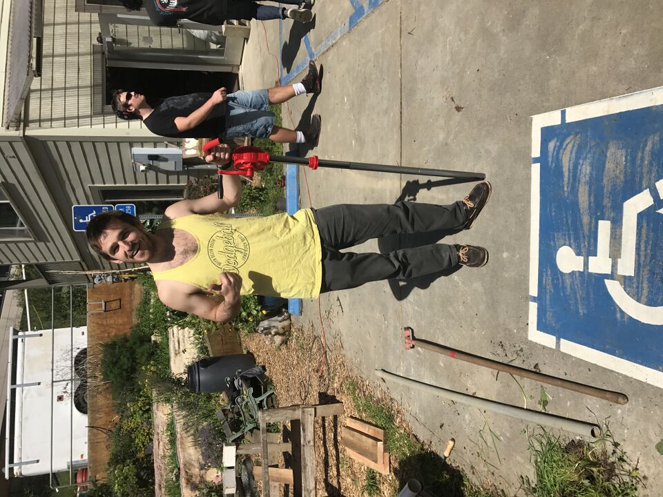 File:Austingholdingthepump.JPG