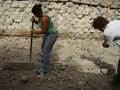 Fig 13: By using an iron rod and a pick axe the concrete surrounding the rebar was removed.