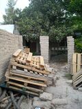 Fig 1: wood pallets, which we later broke down for lumber