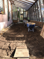 A layer of dirt before building up the wood chip walkway.
