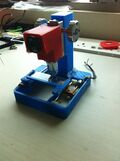 Low cost digital microscope with automated slide movement)