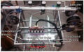 Open Source Multi-Head 3D Printer for Polymer-Metal Composite Component Manufacturing