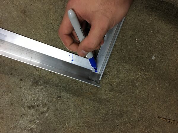 File:Marking drill hole.JPG