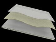 Titanium Sun Shield Primer and topcoat application over the polypropylene exterior of a WorldShelters temporary structure