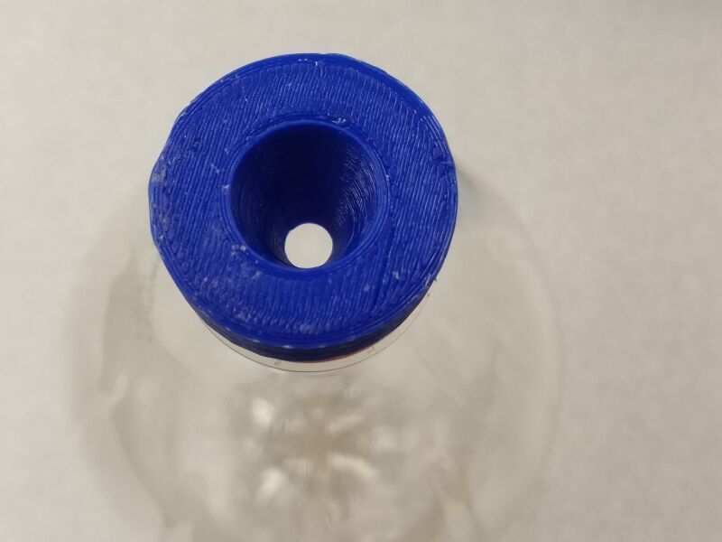 File:Capped bottle top view.jpg