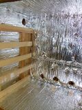 Fig 3b: Shelving and Insulation being installed.