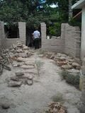 Fig 1c: we broke down the unsuitable bricks in a pit to make mud