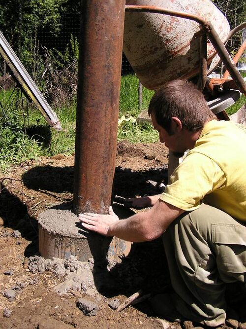 File:Finishing the concrete.jpg