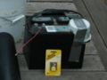 Deep cycle lead acid battery with a home made plastic terminal cover.