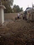 Fig 1: Previous to this photo the area was cleared of both organic and inorganic materials. There was a lot of trash and also a large decomposing tree. There was also a large adobe and concrete oven. The entire top of it was taken off, broken up and spread over the ground to make it higher and flat.