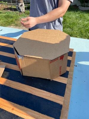 Students built the second prototype from cardboard and duct tape.