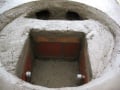 A small semi-circle was carved out toward the back end of the front burner and tunnels dug out through the hollow half bricks