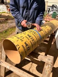 Dave Enos cutting 12" sonotube form for foundation piers