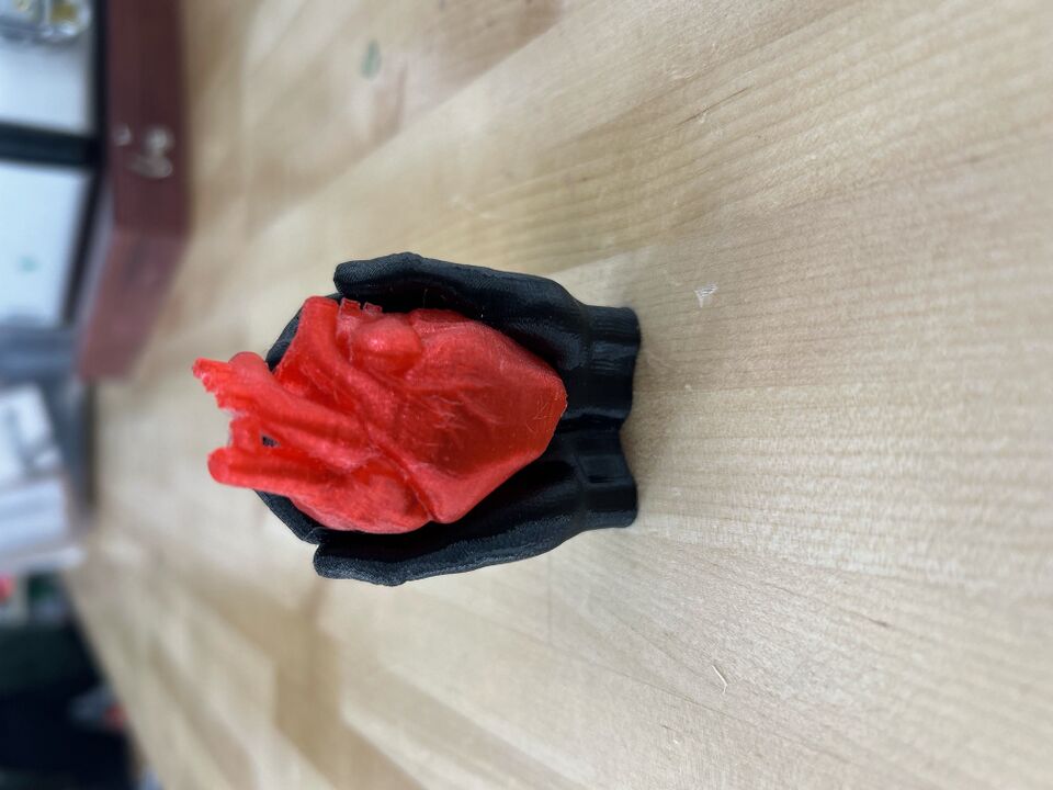 File:TeamEggBlackHandsRedHeart.jpg