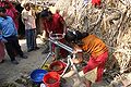 Two stage press being used by villge women Rupendehi Nepal