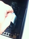 insert slip of paper with the overhead lights turned off.