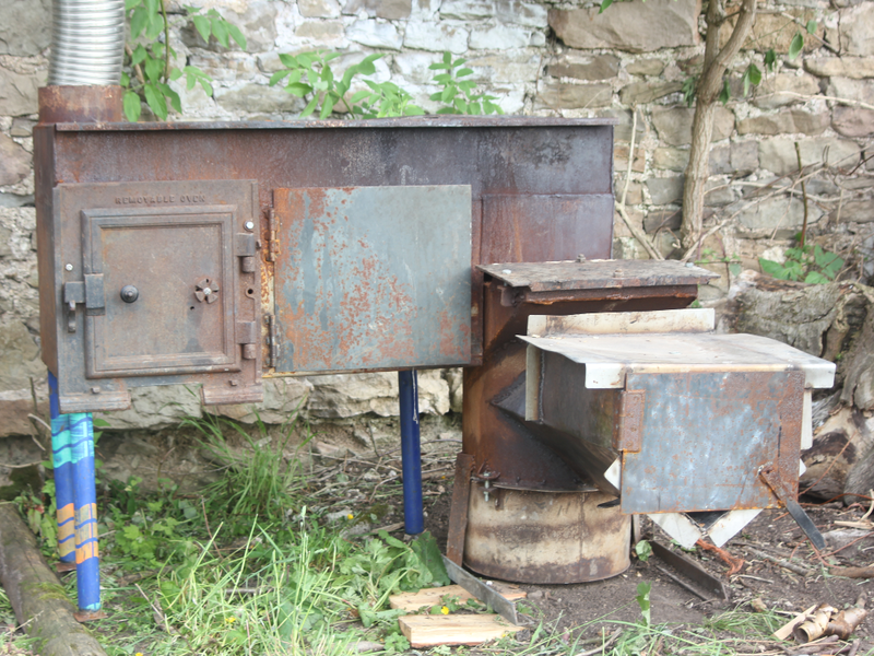 File:Forest biochar rocket stove with cooking module.png