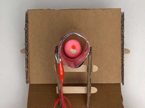 Gynecologic simulator made from cardboard, clay, and aluminium foil for VIA cervical cancer screening training