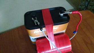 A twelve volt lantern battery.