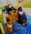 Mixing clay slurry & straw