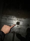 Step 1b. Spray water underneath bus to test the watertightness of welds. Most welds failed this test.