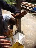 Fig 5: Kimberli Hudson demonstrates the clay squeeze test.
