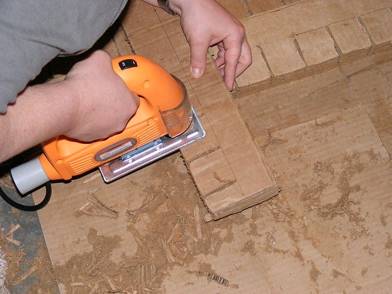 File:Cutting the slits in the cross braces.JPG