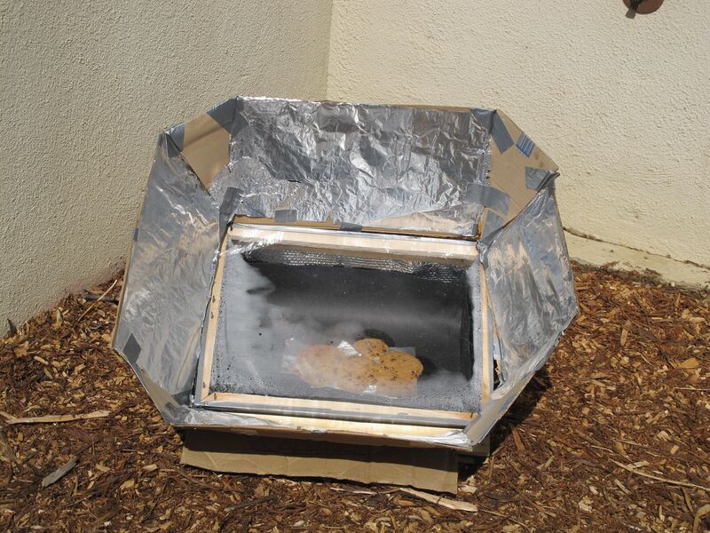 Locally Delicious solar oven for kids with adults Appropedia The