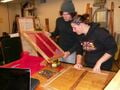 Fig 3g: James Courtney and Mary Wooldridge inspecting a finished drying rack.