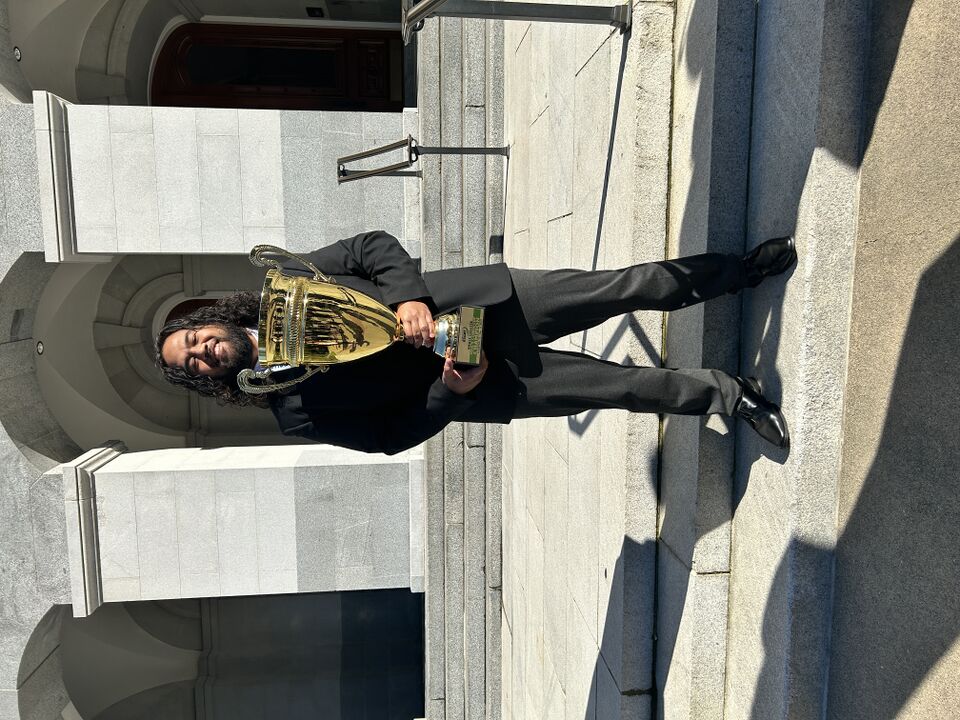 File:LatuWithTrophy.jpg