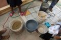 Buckets left to right: Light sand, dark sand, caliche, more caliche, and wheat paste/lime/caliche mixture.
