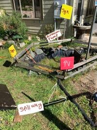 Image 1: Pond modeling the retaining wall, spillway, aeration system, possible signage (yellow) and solar panel (red) positioning.