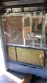 Step 8c. Wall panels removed, fiberglass insulation exposed