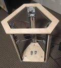 My Delta-style Athena II printer with my first print on the bed.