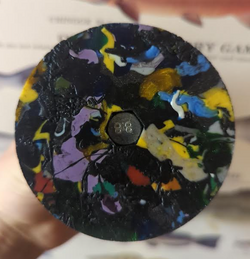 Image of reclaimed shredded PLA disk