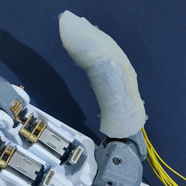 File:WeArm-thumb-silicone-skin.jpg