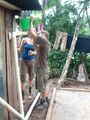 Fig. 8f: Carrie and Max mounting the bucket filters