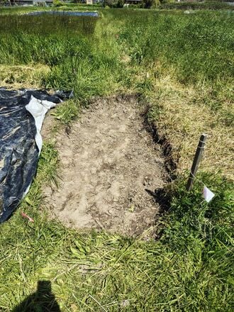After our first day of digging, we had a 4 foot by 10 foot by 6 inch hole