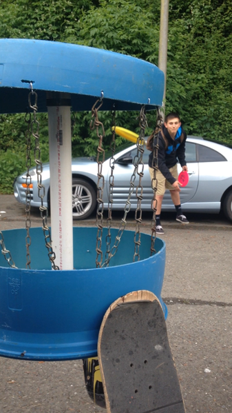 File:Discgolfbasketinaction.png