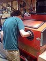 Fig 3a: Dustin (HSU student) doing some precision metal cutting.