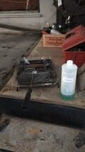 Step 3a. Coat entire floor with Ospho rust converter, using a multi-use paint roller. Wear gloves and eye protection.