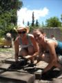 Fig 1: Linsey and Ryndie pushing the mud mixture into the adobera, or frame