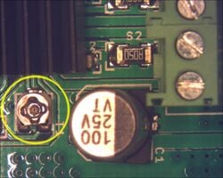 Close up of reference voltage pot.]]Locate the motor reference voltage adjustment potentiometers (see photos).