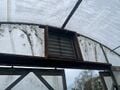 Fan frame used in solar fan setup in the larger greenhouse on Bayside Park Farm.