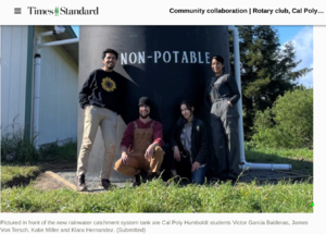 Screenshot of a Times-Standard article on the project. Image includes newpaper name and caption, plus the four students posing in front of the large rainwater tank