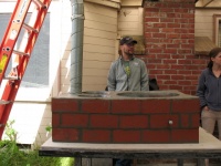Mortar mixture was used to touch-up and fill-in remaining gaps between bricks.