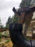 The gutter system ending over the placement of the conveyance system so the water flows directly into it construction