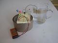 Simple water level detector using a LM555 in astable mode))